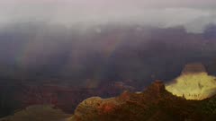 Stormy weather and rainbow near South Rim entrance of the Grand Canyon