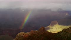 Stormy weather and rainbow near South Rim entrance of the Grand Canyon