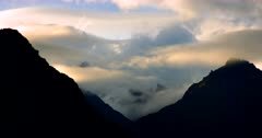 Fiordland silhouetted hills with clouds hanging low in the valleys