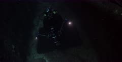 A diver exits the Heian Maru Shipwreck.