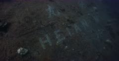 The name of Heian Maru Shipwreck in Japanese and English.
