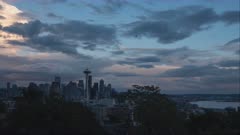 day to night time lapse of the space needle and seattle, washington