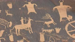 close up of an indian art hunting scene on newspaper rock at canyonlands national park in utah, usa