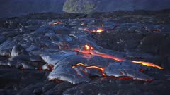 a wide shot of a lava flow from kilauea volcano on the big island of hawaii in the united states of america