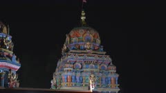 a close up night shot of a dome of the sri siva subramaniya hindu temple in nadi, fiji
