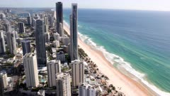 a sunny morning pan of surfers paradise looking north from the Q1 building in queensland, australia
