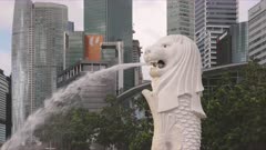 a morning close up shot of the famous merlion fountain at merlion park in singapore
