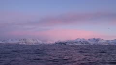 Sunrise in norwegian fjord, gimbal wide shot