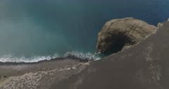Aerial view of Capelinhos volcano on Faial Island / Azores, tilt down move