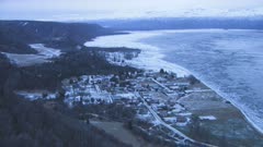 Aerial view of wintery Voznesenka town settled by Russian old believers of the Orthodox church Kenai Peninsula near Homer Alaska USA 