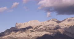 4K Time Lapse of clouds over mountain peak - SLOG2