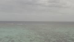Tahiti Aerial Track shot establishing shot Laggon with horizon in the background