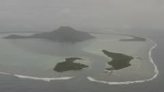 Maupiti Aerial Pass Track / Pan shot with the island in background