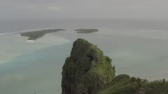 Maupiti Aerial peaks with the lagoon in background Pan Track shot