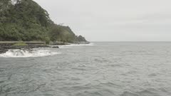 Maupiti Aerial coastline with waves on the rocks