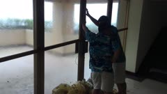 Hotel Staff Struggle To Keep Doors Closed In Violent Hurricane Wind