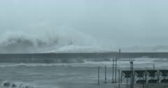 Large Storm Surge Waves Crash into Port During Hurricane