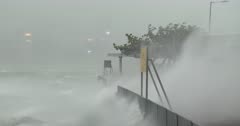 Violent Hurricane Wind And Storm Surge Crash Into Port