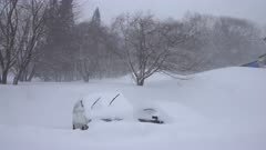 Cars Buried In Snowdrifts During Major Snow Storm
