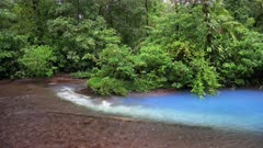 at the confluence of two rivers the blue river Rio Celeste is formed, Parque Nacional Volcán Tenorio, Costa Rica, Central America