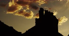Scenic Sandstone Buttes with Majestic Clearing Storm Clouds with the Setting Sun in the Valley of the Gods