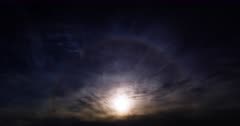 Lunar Halo — A 22° moon halo around the rising moon with Cirrostratus clouds and Pin Point Stars