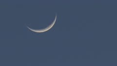 Time Lapse of Waxing Crescent Moon Moving in Night Sky