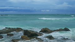 Sea stormy landscape over rocky coastline in Indian ocean