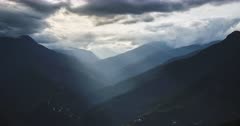 Timelapse of Andes Mountains landscape in Bolivia. Time lapse of sunlight and sun rays filling valley and rainforest scenery in South America