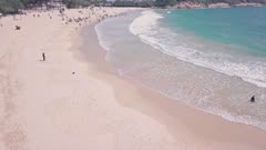 Shek O Beach, a white sandy stretch of sand in Hong Kong Island. Aerial drone view
