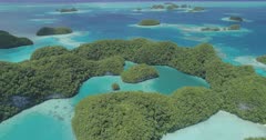Travelling aerial shot over Palau's 70 islands