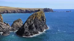 8K static shot of Rocky coastline and seabirds at Kynance Cove in Cornwall