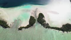 Aerial shot of Palmyra Atoll, satellite view of islands and tidal channel into lagoon.