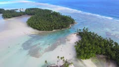 Aerial shot of tidal channel in man-made island at Palmyra Atoll