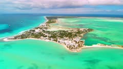 Aerial tracking shot of Kiritimati atoll and turquoise lagoon