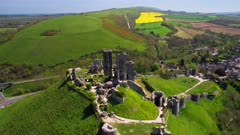 Aerial shot orbiting Castle ruins, in Dorset England