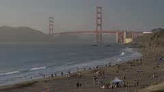 View over Baker Beach towards Golden Gate Bridge at sunset, South Bay, San Francisco, California, United States of America, North America