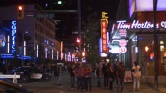 Video of people partying and busy traffic at night, Granville Street, Vancouver, British Columbia, Canada, North America