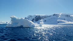 Scenic view of the icebergs and glaciers across the water of Antarctica, Polar Regions