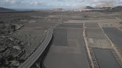 Aerial shot of road in volcanic landscape, Timanfaya National Park, Tinajo, Las Palmas, Lanzarote, Canary Islands, Spain, Atlantic, Europe