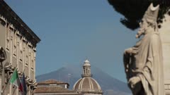 Statue, architecture and Mount Etna from Piazza Duomo, Catania, Sicily, Italy, Mediterranean, Europe