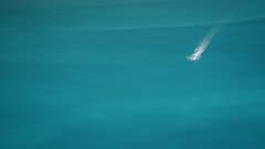 View of jet skis on turquoise sea near Aspros Gialos Beach, Kefalonia (Cephalonia), Ionian Islands, Greek Islands, Greece, Europe