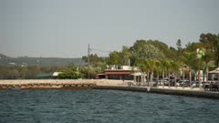 View of harbour and restaurants in Argostolion (Argostoli), Kefalonia (Cephalonia), Ionian Islands, Greek Islands, Greece, Europe