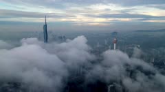 Morning misty morning at PNB 118 and KL tower. Aerial establishing shot