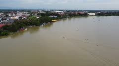 Aerial view boat arrive jetty of Teluk Intan town near Sungai Perak river