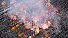 Lamb mutton leg burn on burning charcoal. Delicious street food