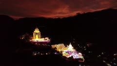 Aerial view beautiful decorated illuminated lantern Kek Lok Si temple in sunset hour