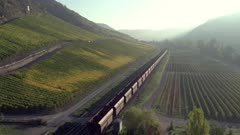 Freight Train Travelling Through the Countryside