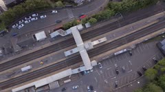 Trains Stopping at a Station in the UK Aerial View