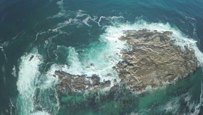 Aerial shot of a Brown Fur Seal colony on Geyser Rock, off the South African coast